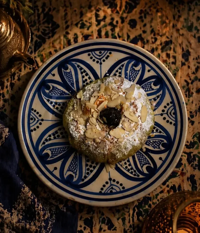 Moroccan pastilla with almonds and icing sugar — Moltaqa Restaurant Yaletown Vancouver
